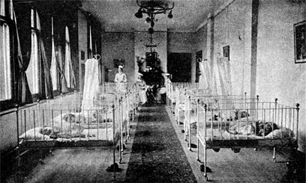 Abandoned infants in an early-1900s orphanage ward